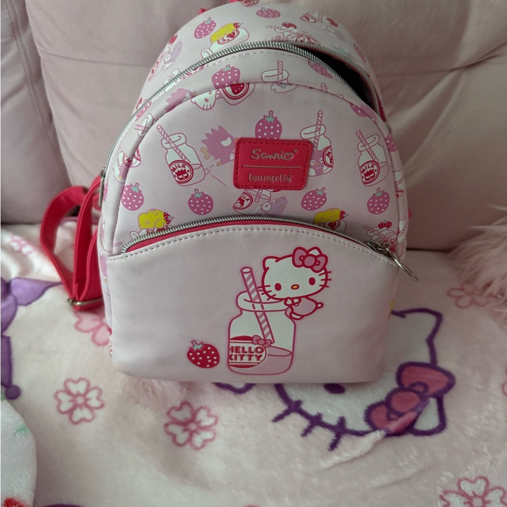 Hello Kitty white and pink strawberry Loungefly backpack